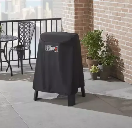 Weber Barbecue Hoes Lumin met Onderstel Premium in gebruik